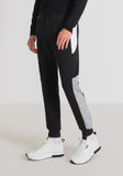 PANTALONES REGULAR FIT DE FELPA DE MEZCLA DE ALGODÓN ELÁSTICO CON BANDAS LATERALES EN CONTRASTE
