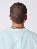 CAMISETA AJUSTADA ESSENTIALS VERDE
