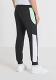 PANTALONES DEPORTIVOS REGULAR FIT DE MEZCLA DE ALGODÓN Y POLIÉSTER SOSTENIBLE CON ESTAMPADO DE GOMA