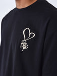 Camiseta con corazón bordado - Negro