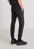 PANTALÓN SLIM FIT DE FELPA DE ALGODÓN ELÁSTICO CON CONTRASTE DE TEJIDO TÉCNICO